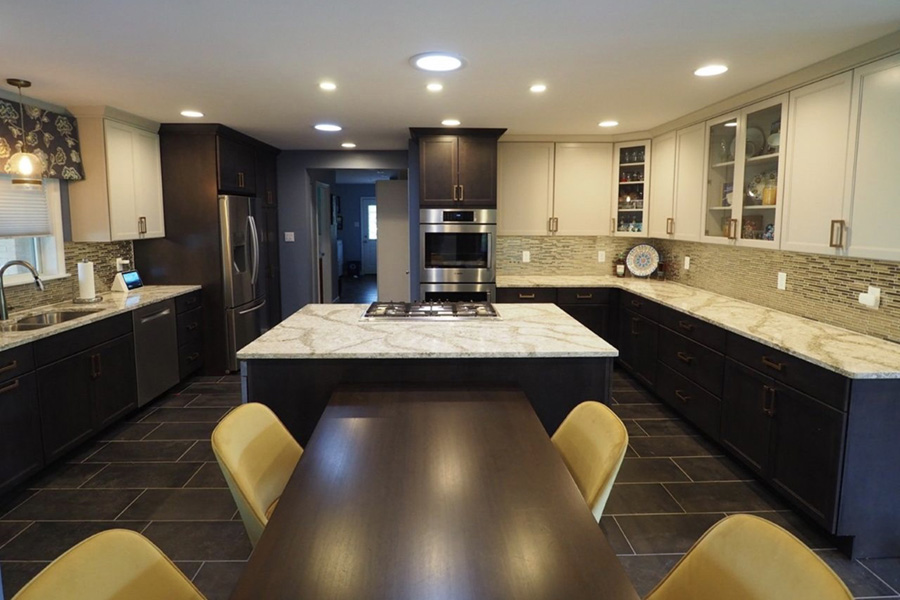 dark tile and cabinets with bright accents