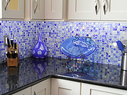 Contemporary Kitchen With Glass Accents - Blue Backsplash