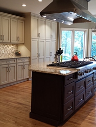 Transitional Kitchen With Island Cooktop - Wood Floor