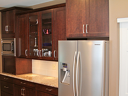 Warm Kitchen With Backsplash Details - Refrigerator