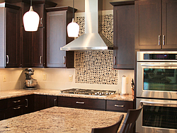 Warm Kitchen With Backsplash Details - Stovetop