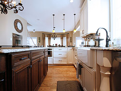Transitional Kitchen With Accent Island - Wood Floor