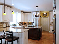 Transitional Kitchen With Accent Island - Peninsula Seating