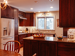 Contemporary Cherry Kitchen - Dining View