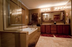 Warm Bathroom With Glass Shower
