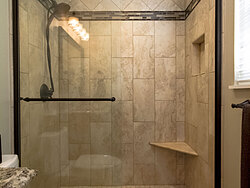 Small Bathroom With Decorative Tile - Glass Shower Door