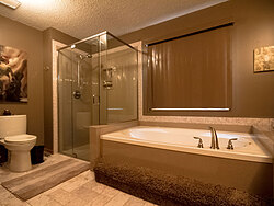 Warm Bathroom With Glass Shower - Bath Tub Design