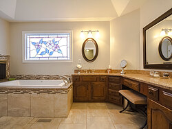 Neutral Bathroom With Fireplace - Bath Remodeling