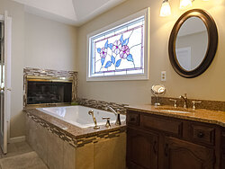 Neutral Bathroom With Fireplace - Bath Tub