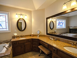 Neutral Bathroom With Fireplace - His And Hers Sinks