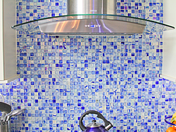 Contemporary Kitchen With Glass Accents - Blue Tile Backsplash