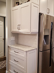 White Kitchen With Granite Countertops - Corner Cabinets