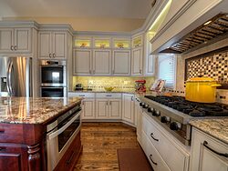 White Kitchen With Accent Island - Oven